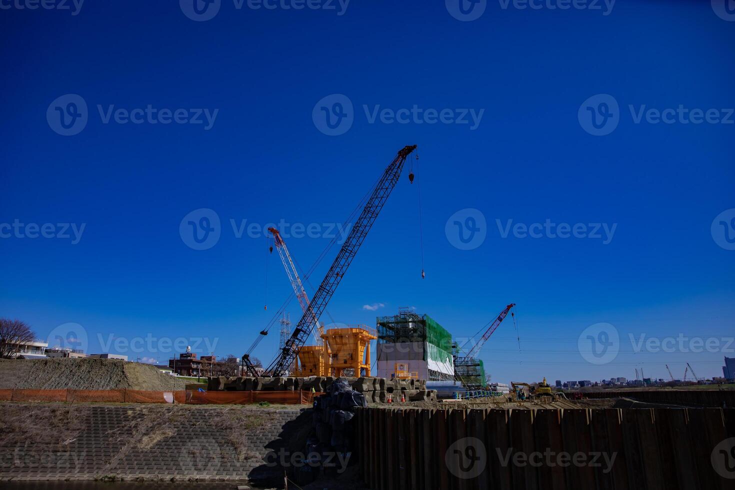 Cranes at the under construction wide shot photo