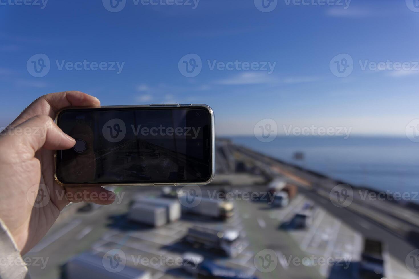 A traffic jam shooting by smartphone on the highway at Tokyo bay area in Chiba photo