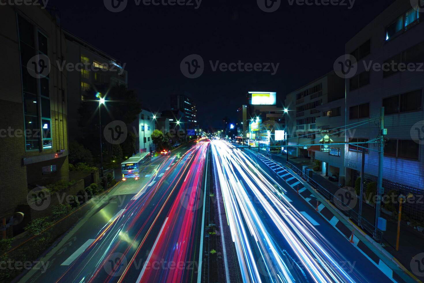 A night traffic jam at the urban street in Tokyo wide shot photo