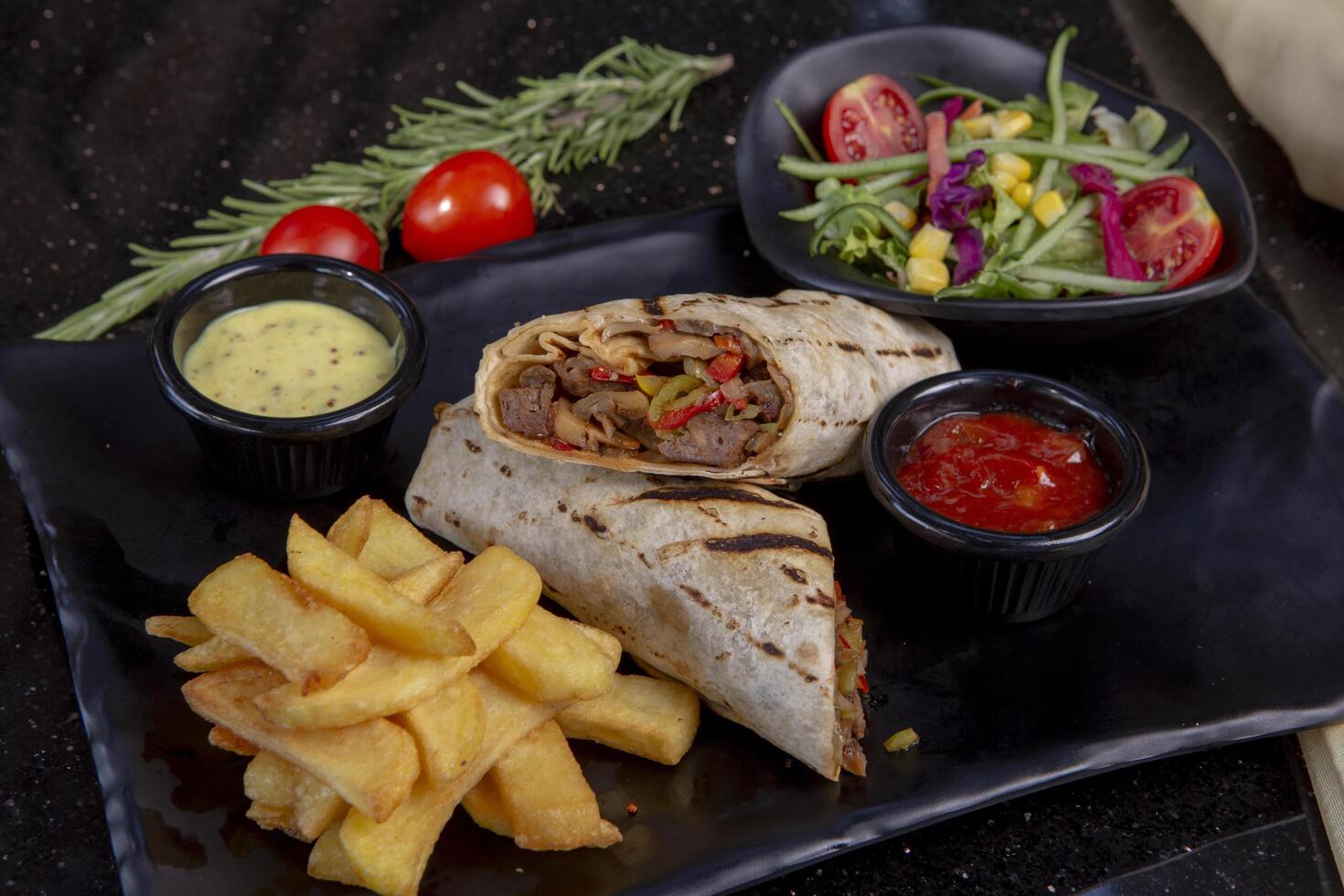 Pita bread lavash roll chicken doner kebab and fresh vegetables photo
