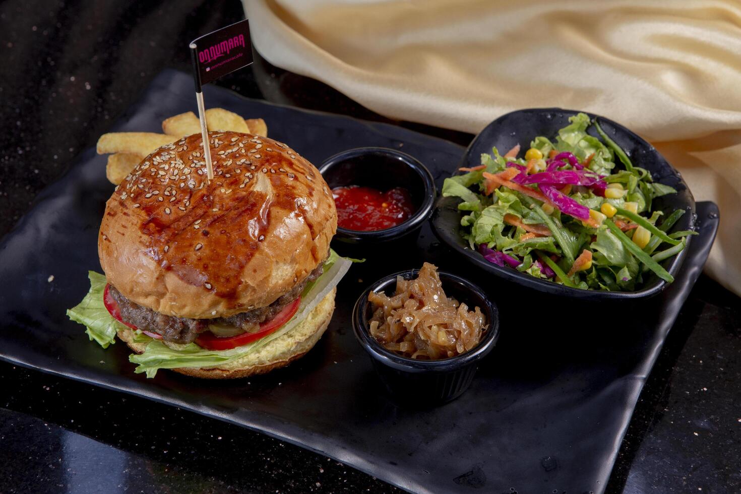 Delicious fresh juicy burger with beef cutlet, cheese, with salads photo