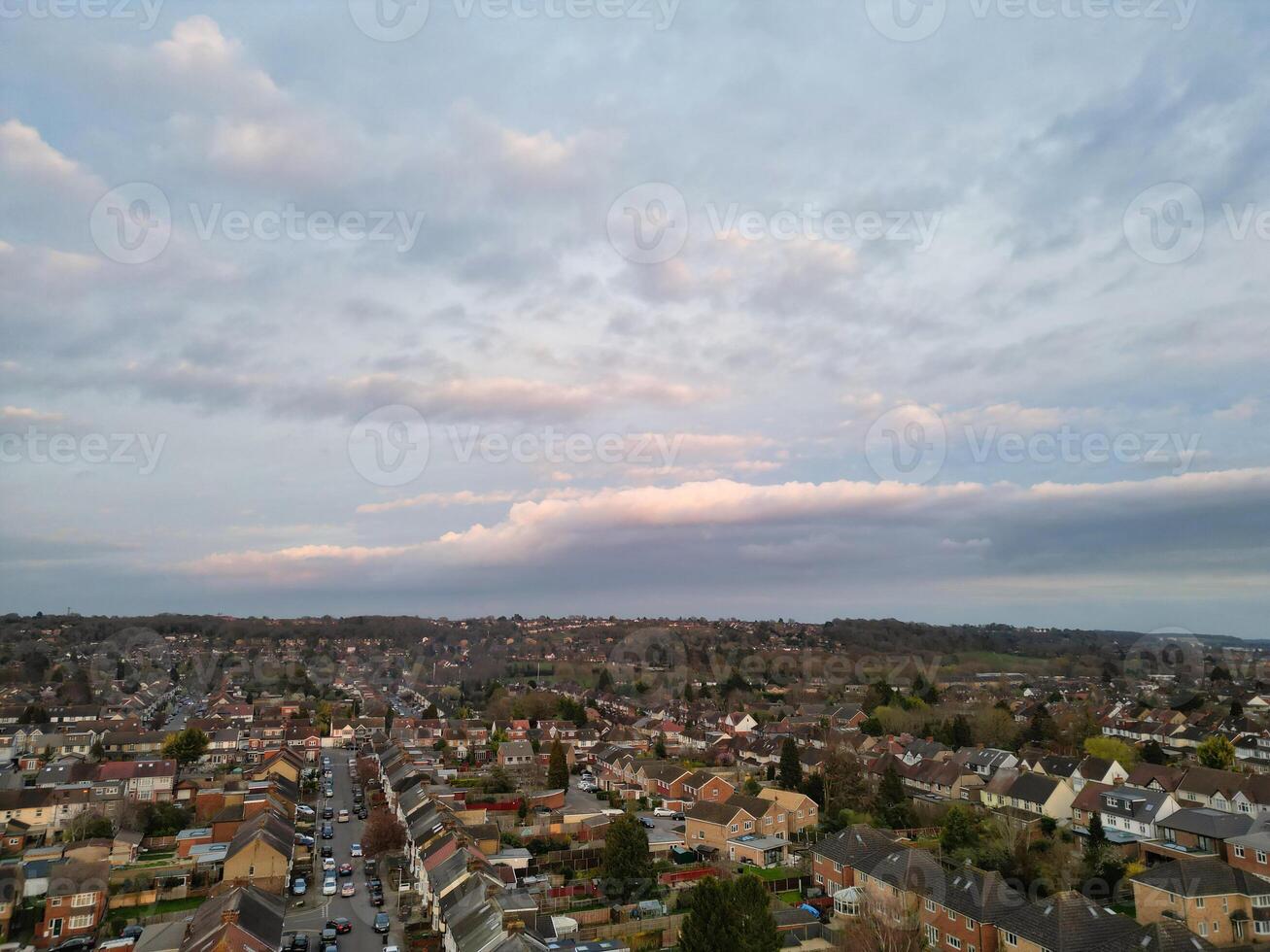 Most Beautiful Aerial View of Residential District During Orange Sunset over Luton, England UK. March 19th, 2024 photo