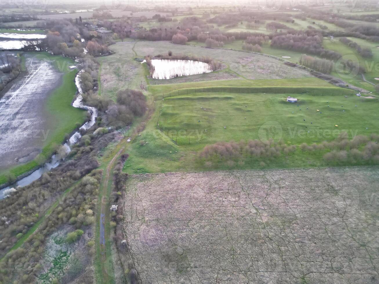 Aerial View of British Countryside Landscape Near Oxford City, Oxfordshire, England UK During Sunrise Morning. March 23rd, 2024 photo