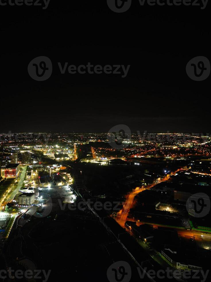 Aerial Night View of Illuminated City Centre Buildings of Birmingham Central City of England United Kingdom. March 30th, 2024 photo