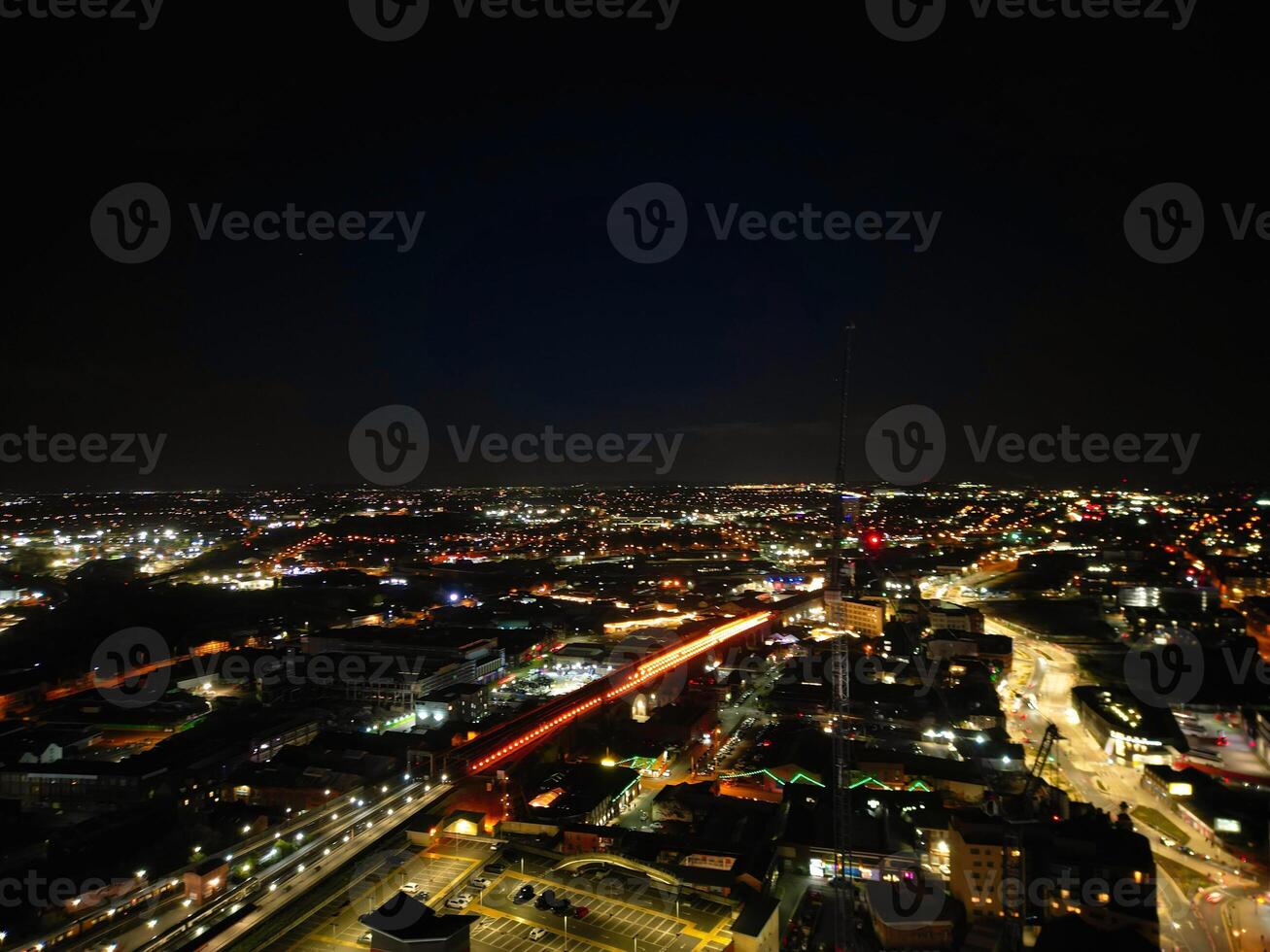 Aerial Night View of Illuminated City Centre Buildings of Birmingham Central City of England United Kingdom. March 30th, 2024 photo