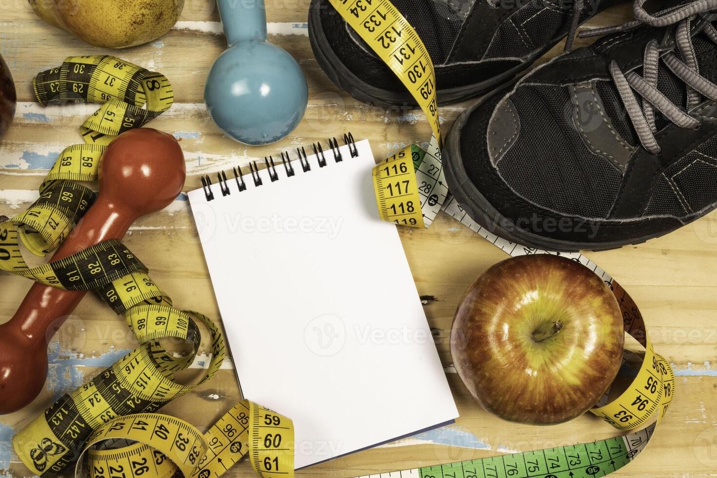 fruit for weight loss with measuring tape and equipment for exercise and diet, weight loss photo