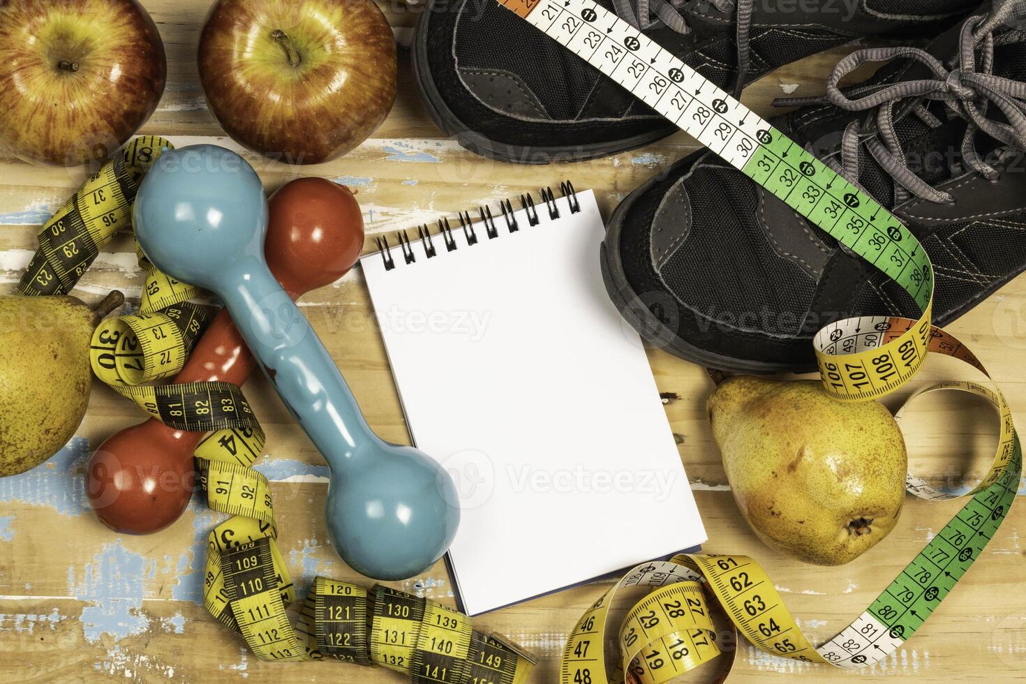 fruit for weight loss with measuring tape and equipment for exercise and diet, weight loss photo