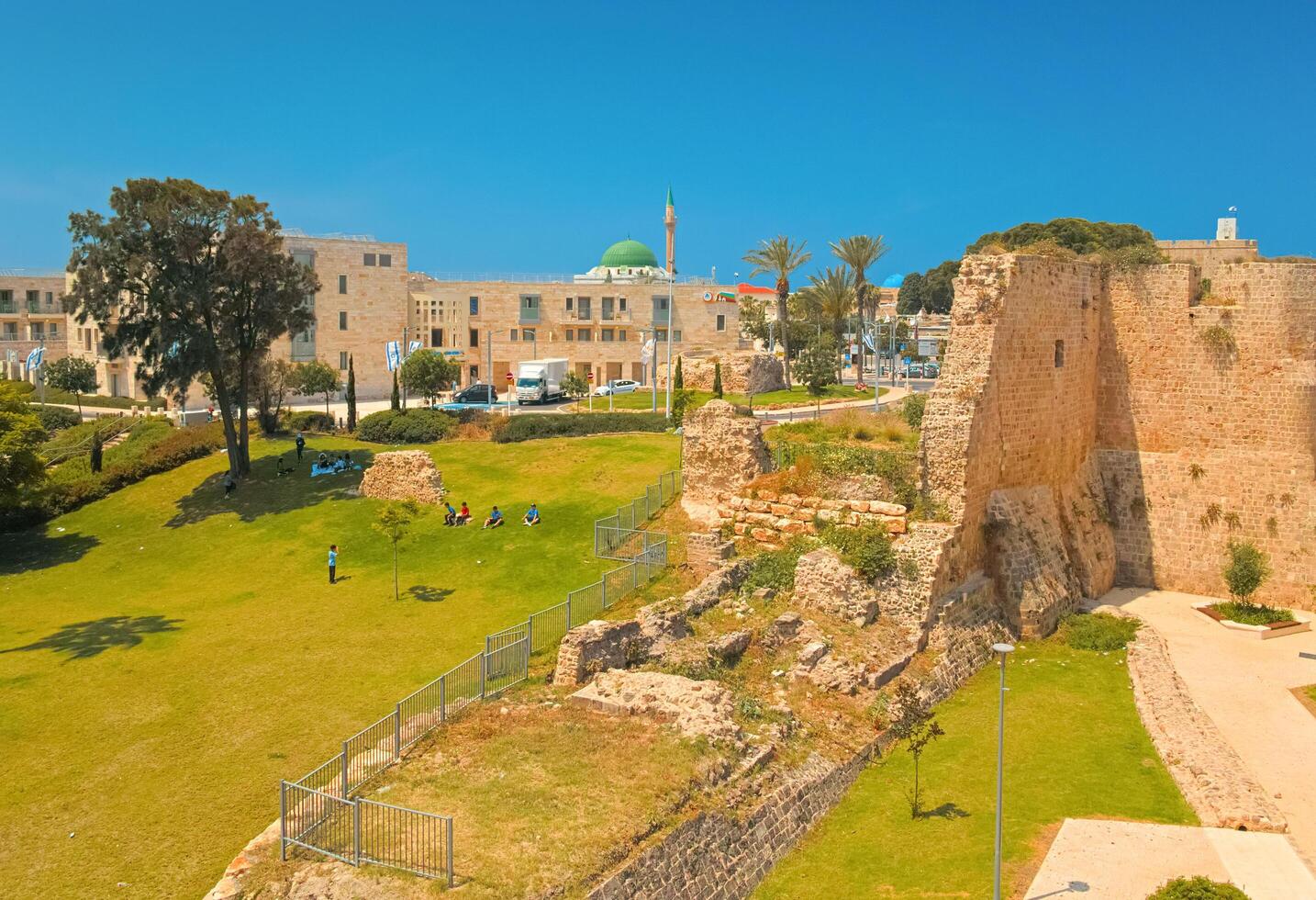 Acre, Israel - 10 May, 2023. Ruins of an ancient city wall in one of the oldest cities in Israel photo