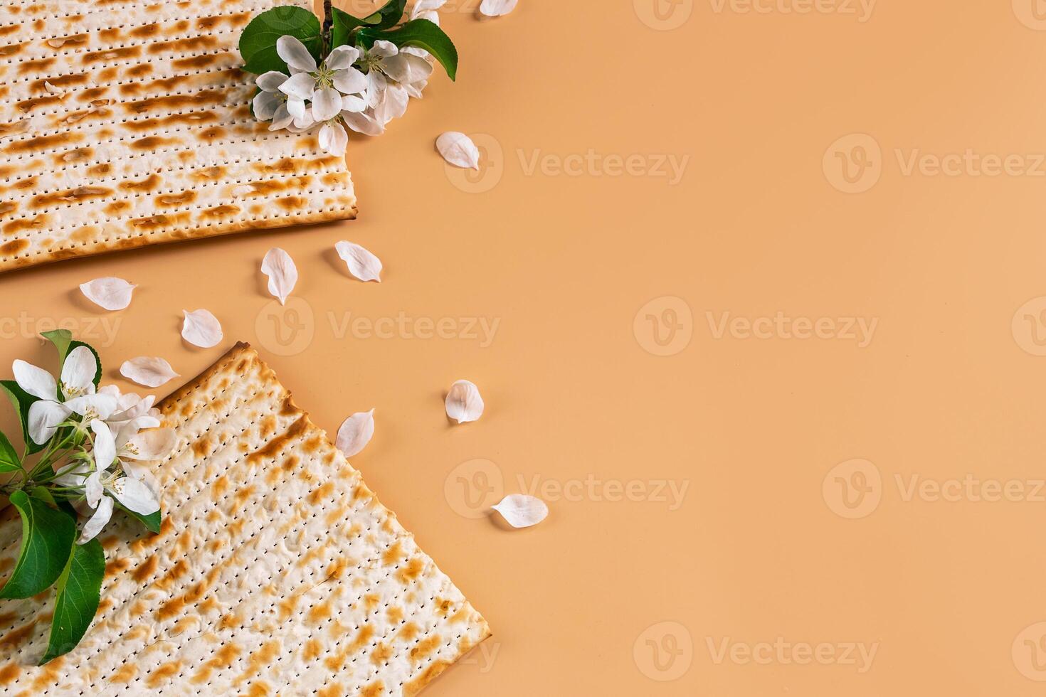 Traditional Jewish holiday Passover. Spring flowers and matzah bread photo