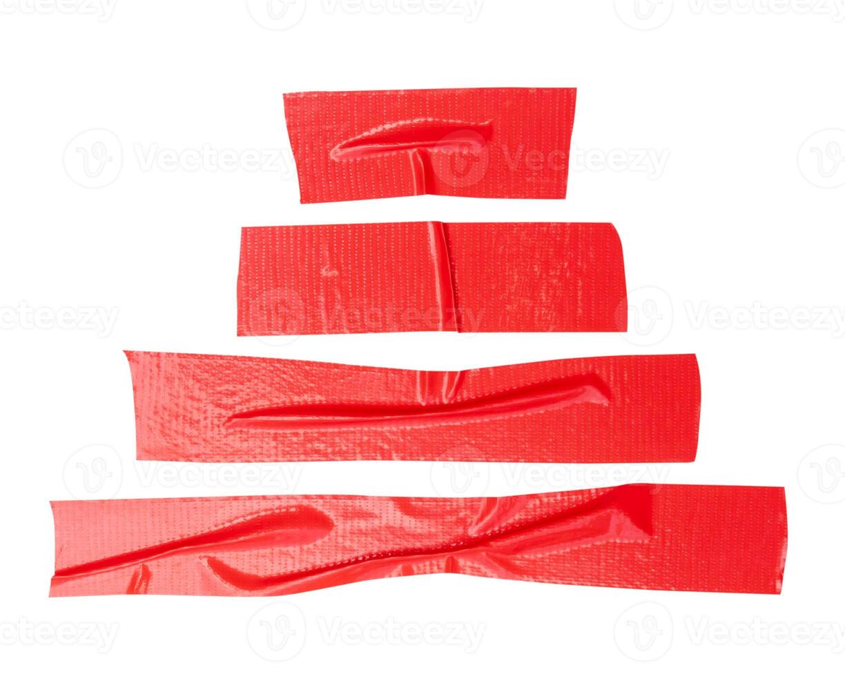 Top view set of wrinkled red adhesive vinyl tape or cloth tape in stripes shape isolated on white background with clipping path photo