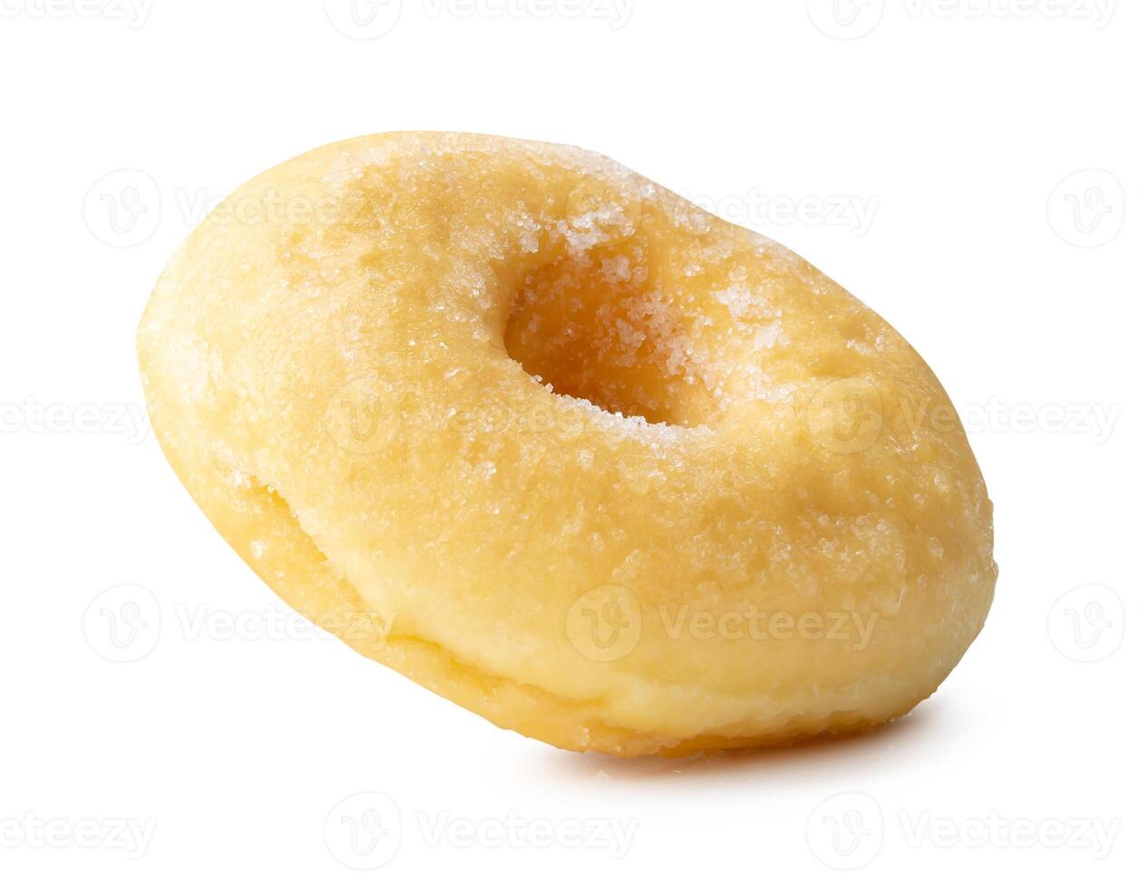 Side view of single sugar glazed cinnamon donut isolated on white background with clipping path photo