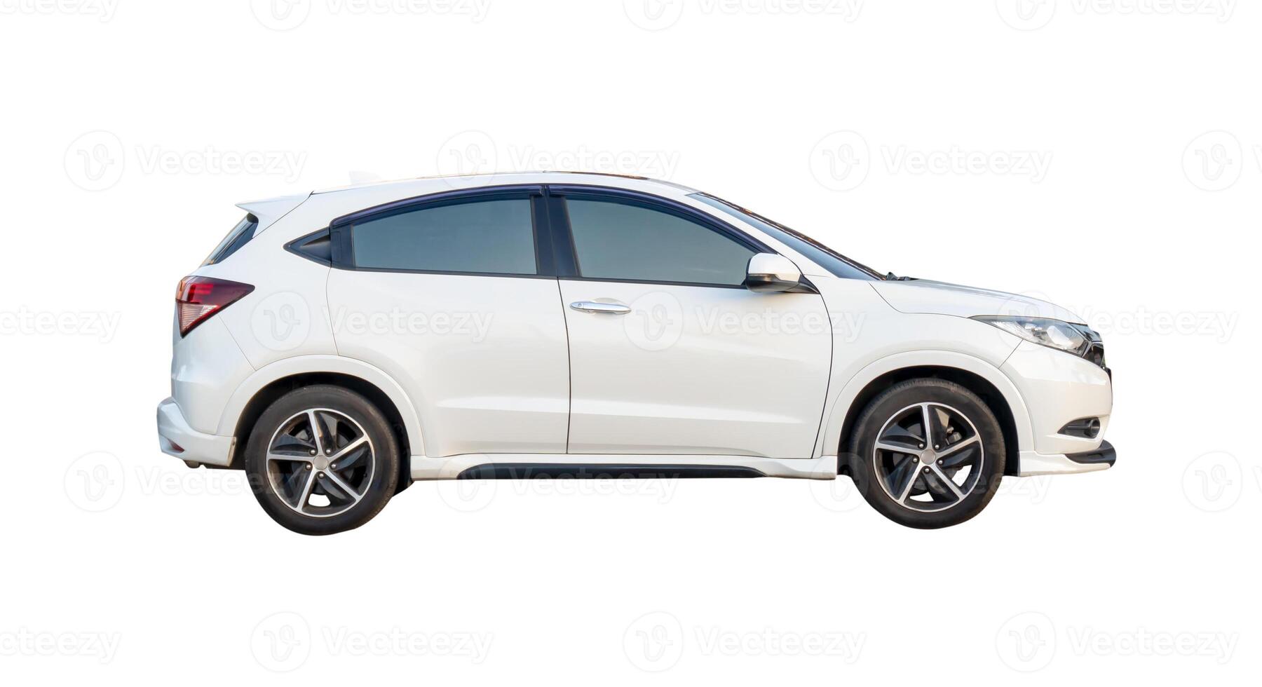 Side view of luxurious white hatchback sports car isolated on white background with clipping path photo