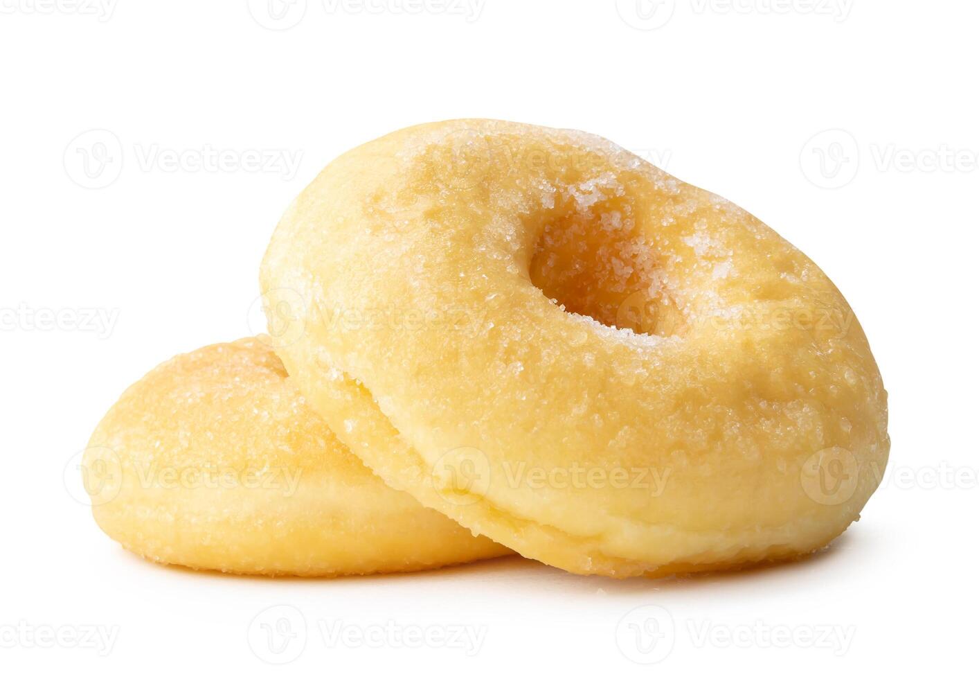 Side view of two sugar glazed cinnamon donuts in stack isolated on white background with clipping path photo