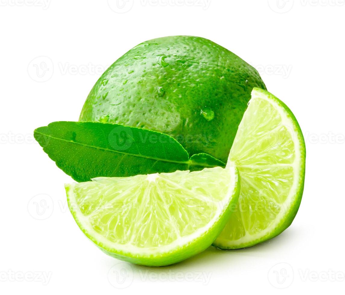 Front view of fresh green lemon fruit with slices or quarters and leaf isolated on white background with clipping path photo