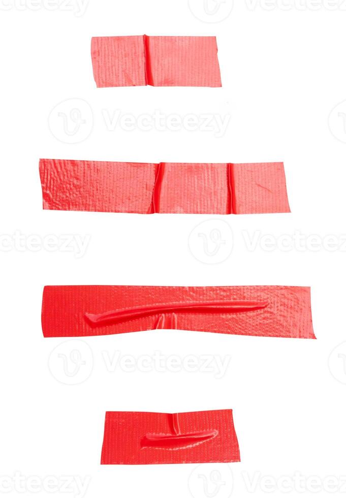 Top view set of wrinkled red adhesive vinyl tape or cloth tape in stripes shape isolated on white background with clipping path photo