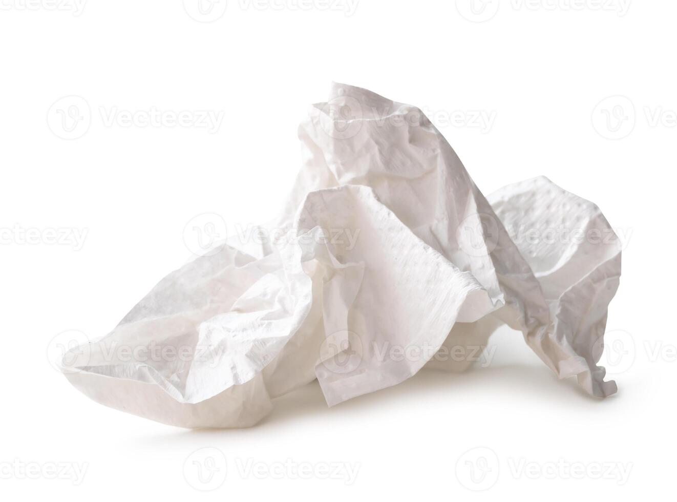 Front view of crumpled tissue paper or toilet paper ball after use in toilet or restroom isolated on white background with clipping path photo