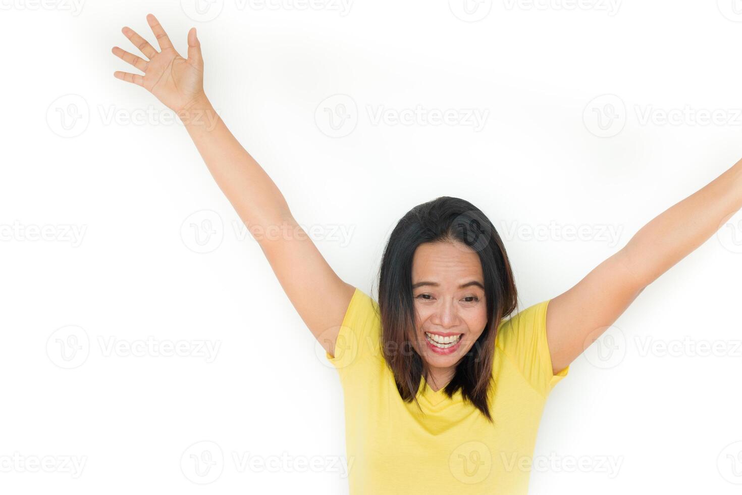 Happy woman raising hands. Happy mood. Isolated on white. photo