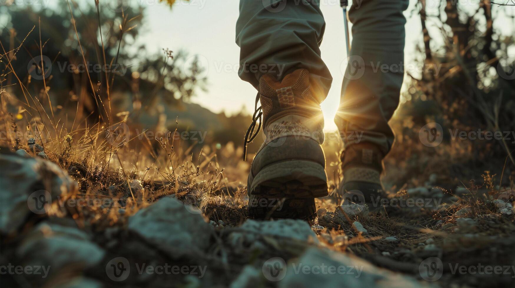 AI generated Hiker Boots on Mountain Trail at Sunset. a close-up shot of their left foot from the ground. a cinematic photo of a scene of a hiker hiking