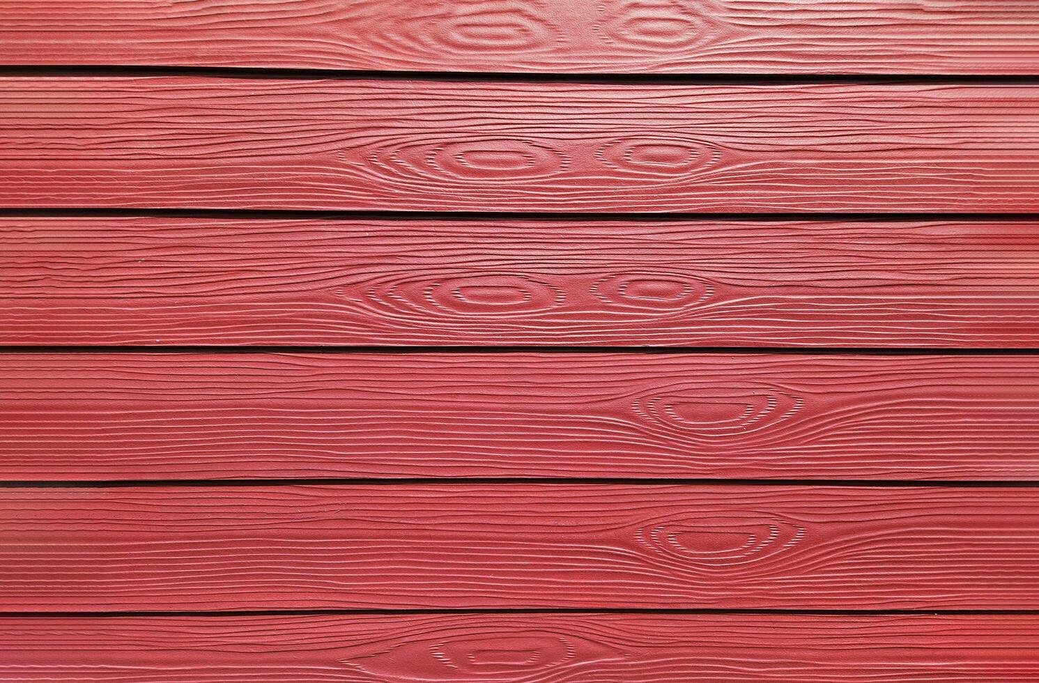 Art of line pattern on red wooden wall background. Abstract and wallpaper exterior design of wood surface. photo