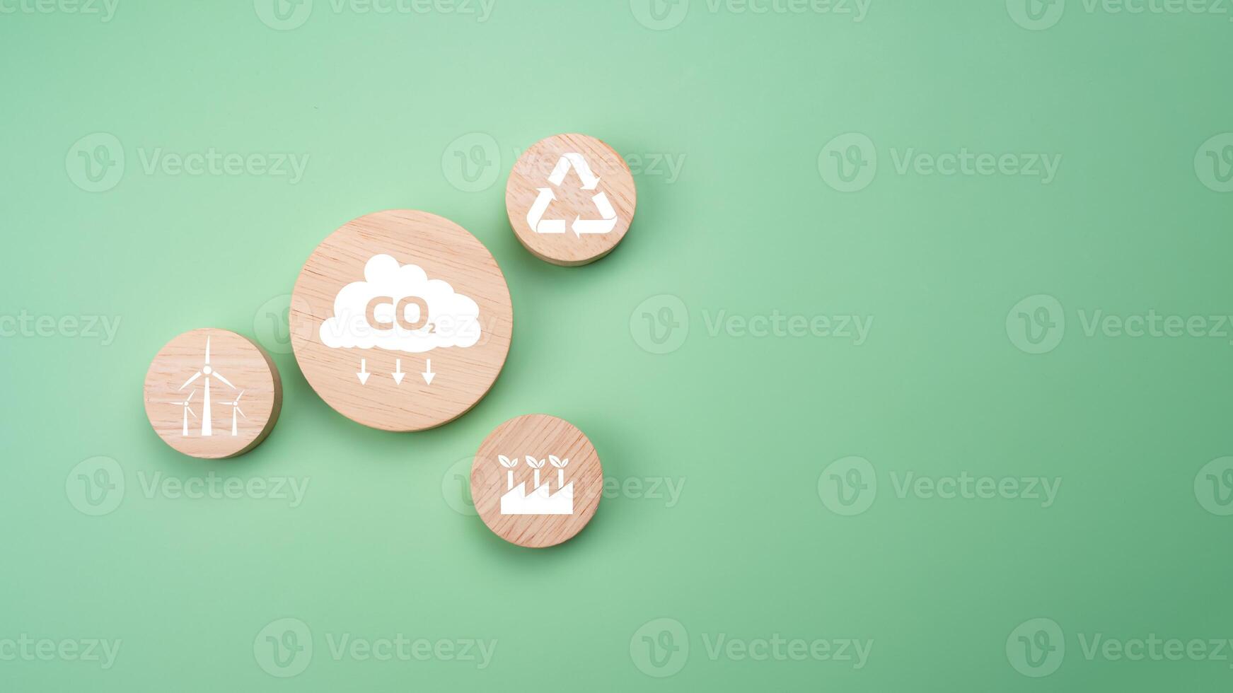 Circular wooden board with net zero icon in 2050 on green background, Net zero by 2050, Carbon neutral, Net zero green house gas emissions target, Climate neutral long term strategy, No toxic gases. photo