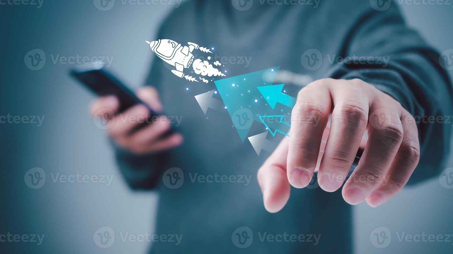 Start up business concept to success, Man holding smartphone and white rocket icon is launch and soar flying out from screen with network digital technology, Finance business growth concept. photo