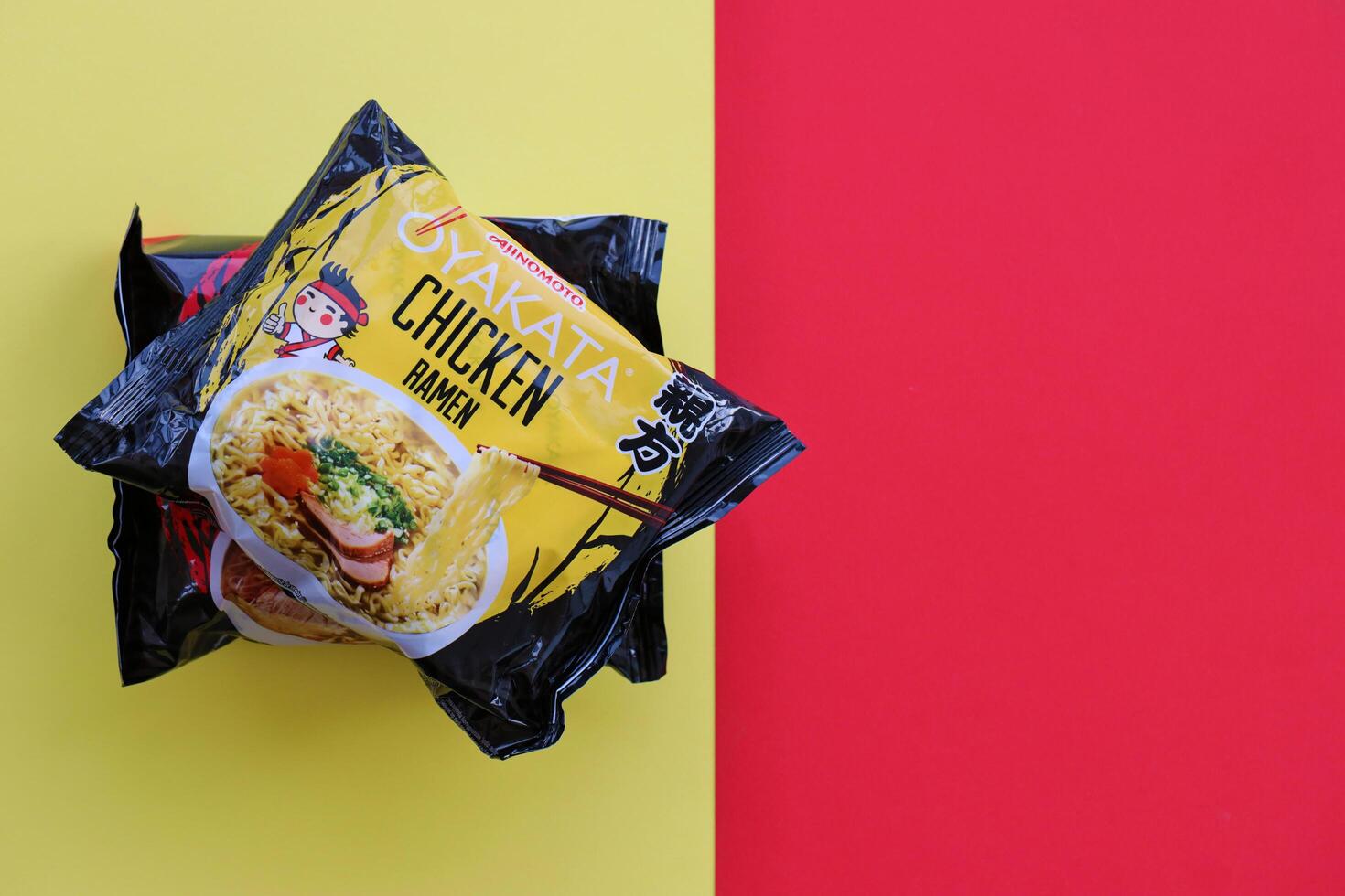 KYIV, UKRAINE - OCTOBER 31, 2023 Packs of of Ajinomoto Oyakata Japanese instant noodles chicken ramen and soy sauce ramen photo