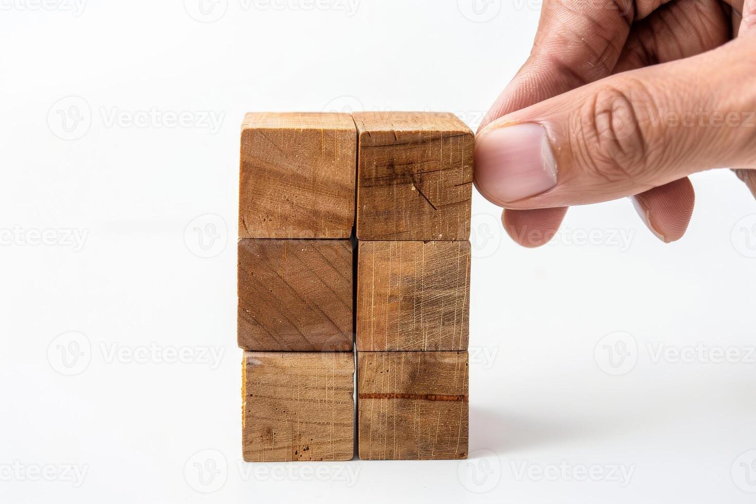 AI generated Hand with Wooden Cubes Isolated on White Background photo