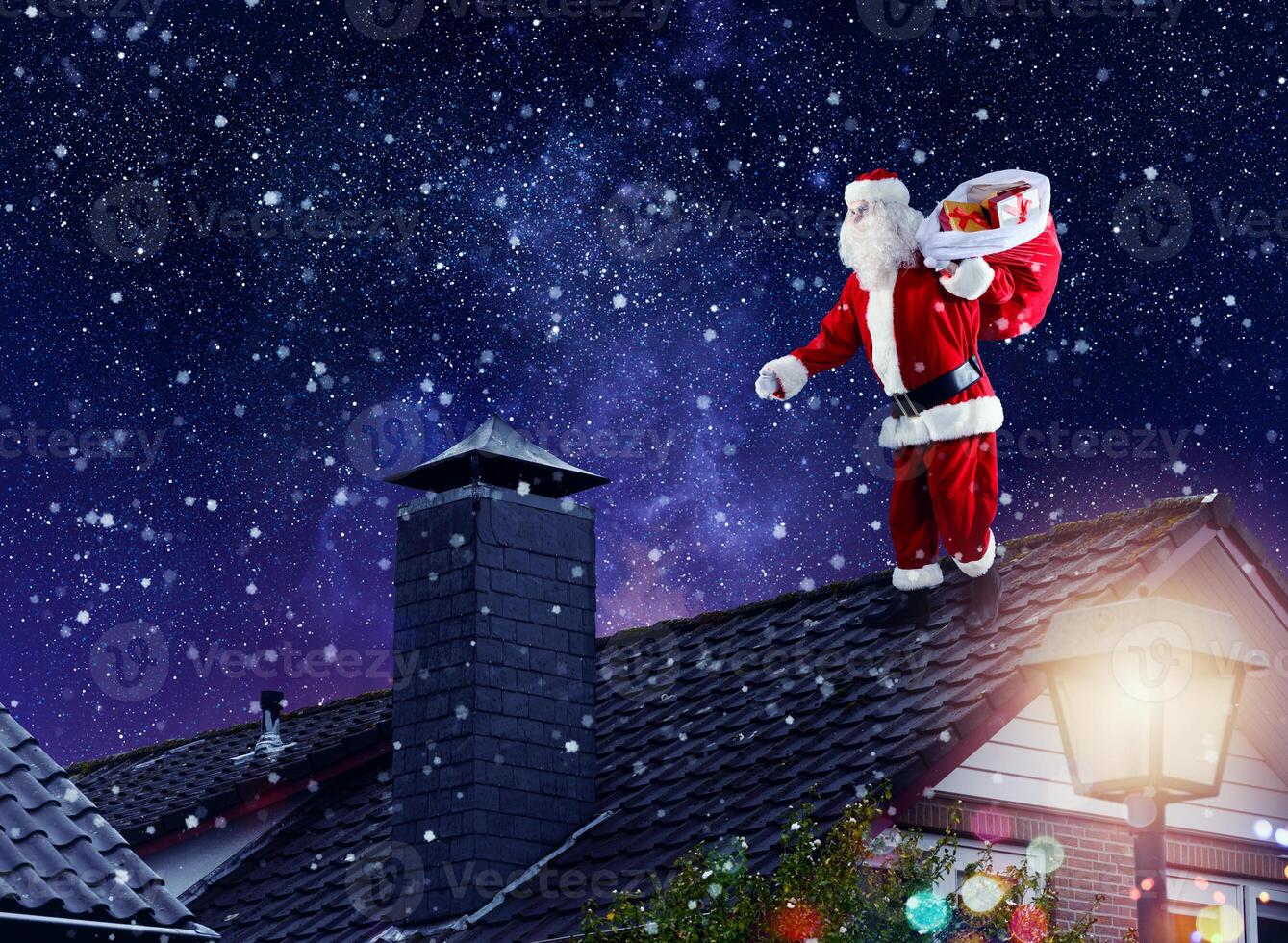 Santa claus ready to deliver presents for Christmas photo
