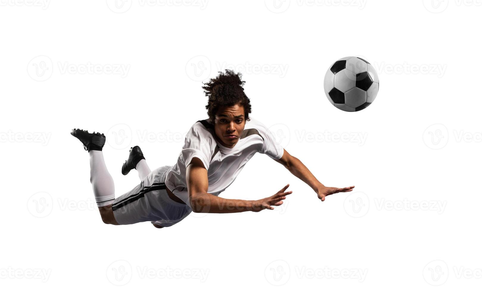 Football player kicks the soccer ball ready to the match photo