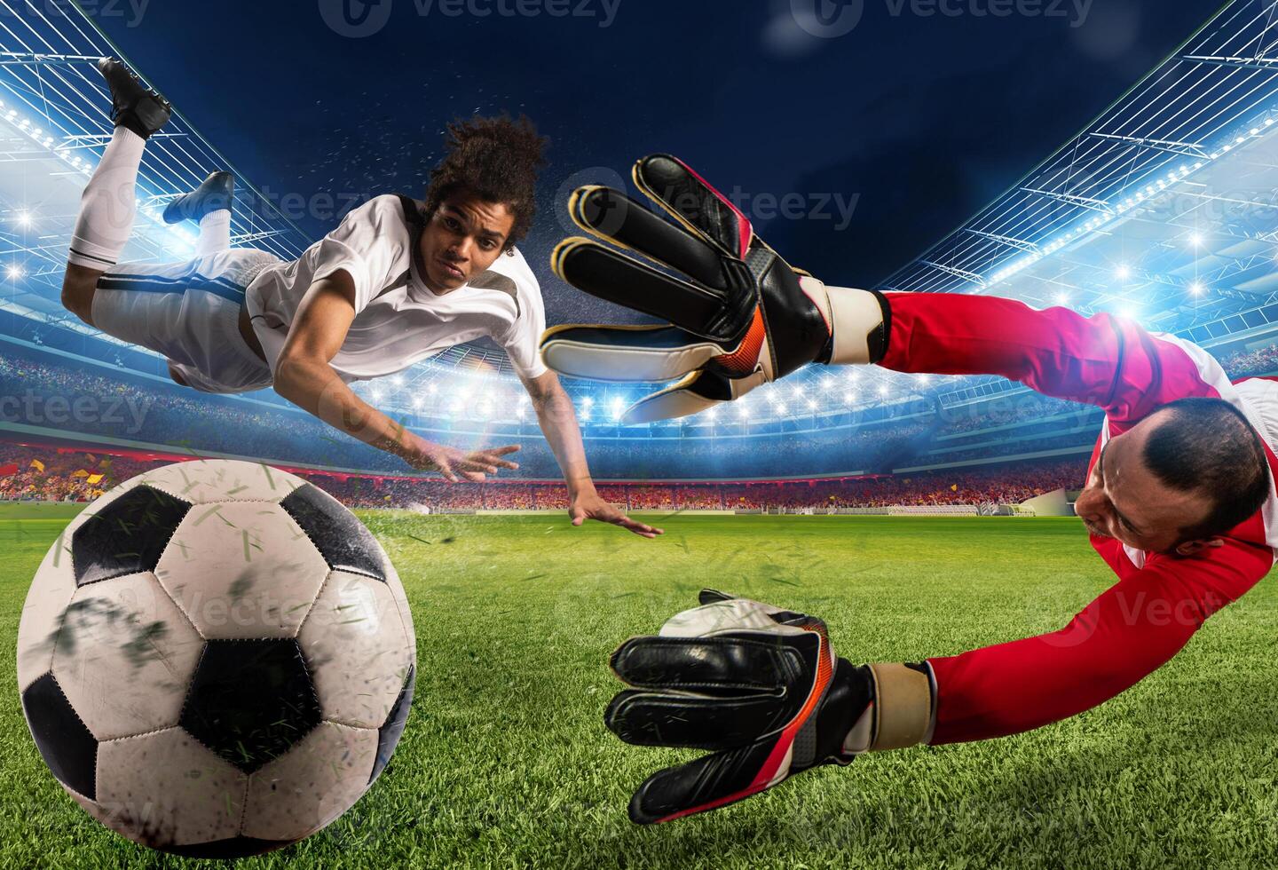 Goalkeeper catches the ball in the stadium during a football game. photo