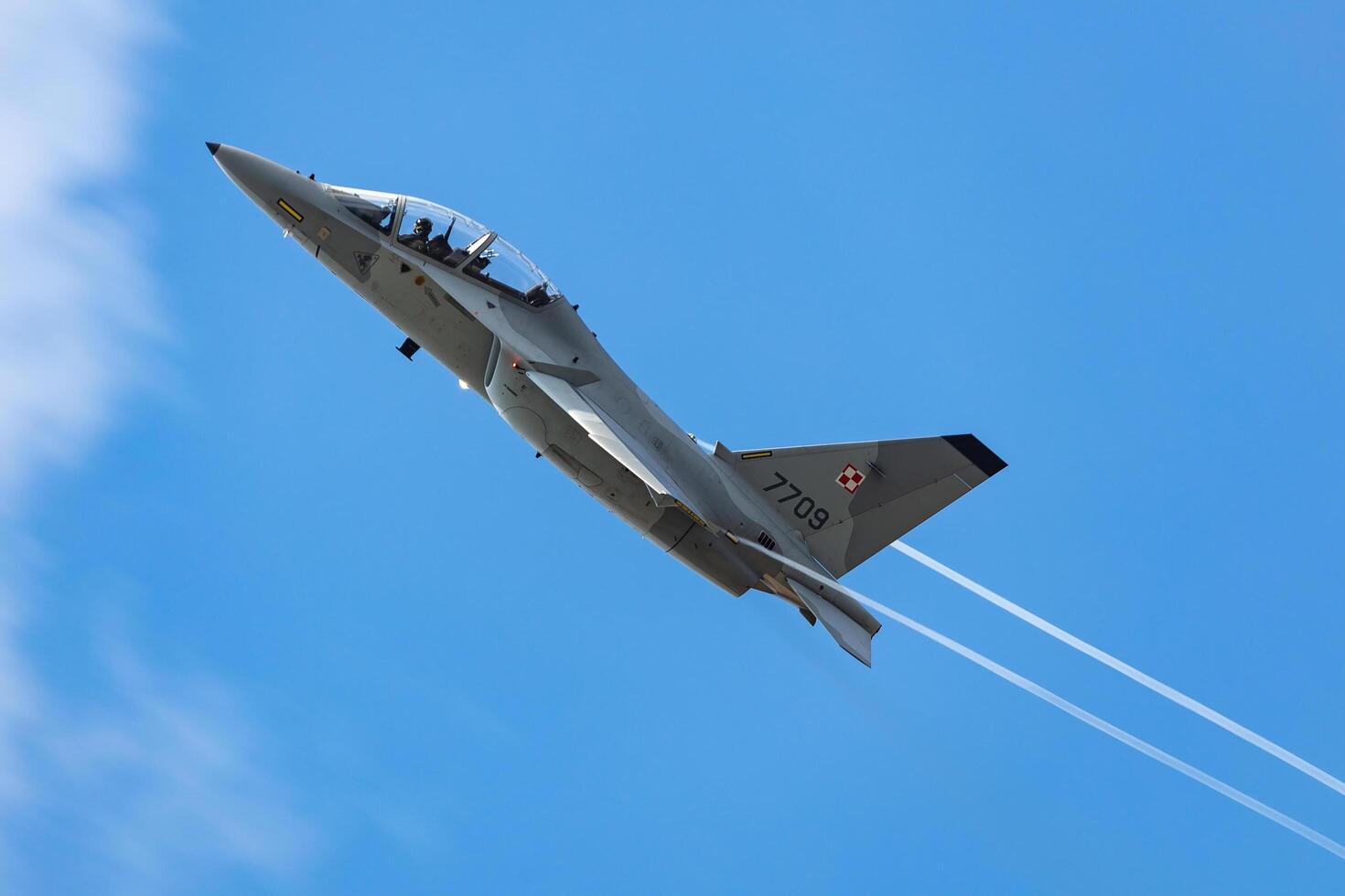 Radom, Poland, 2023 - Polish Air Force Leonardo M-346 Master Bielik trainer jet plane flying. Aviation and military aircraft. photo