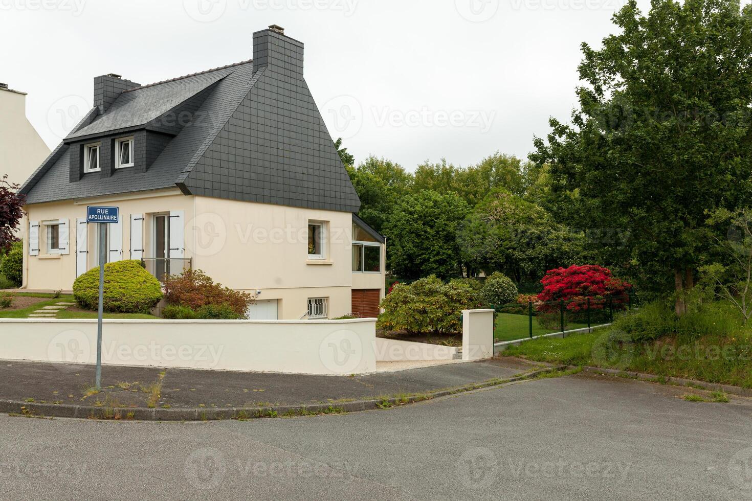 Rural two storey house exteriour, summer outdoors Brest, France, 28 May 2018 photo