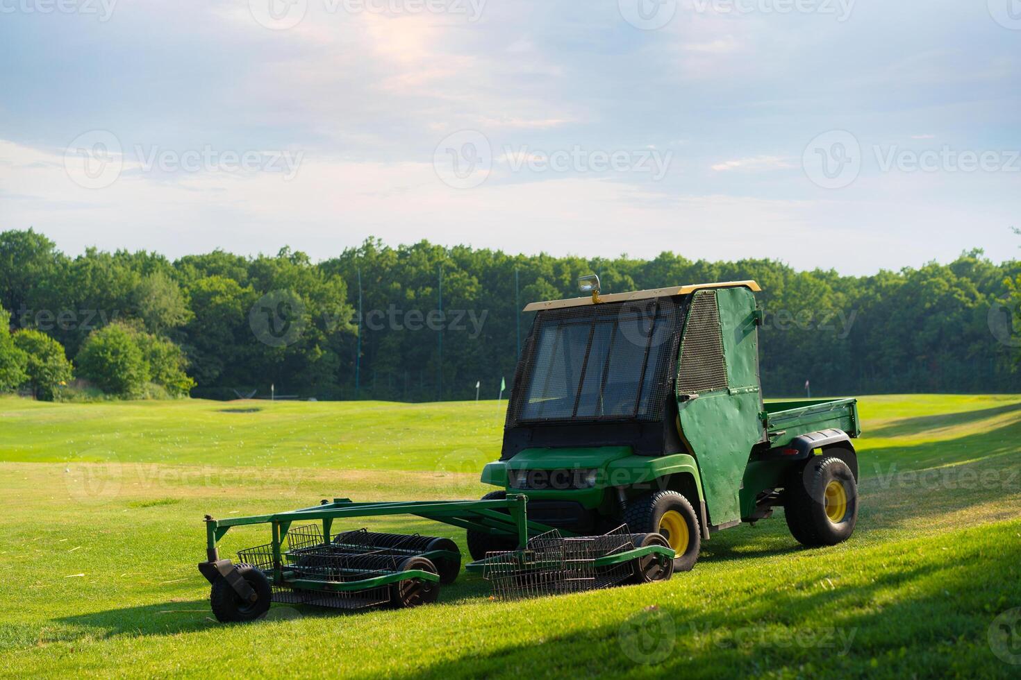 Golf ball piker collector machine Electric car for collect golf balls on field photo