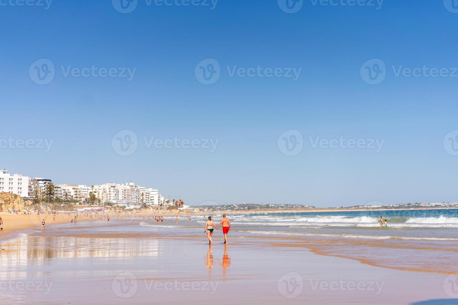 Armacao de Pera Algarve Portugal. Beautiful view on Atlantic ocean at day time and city photo