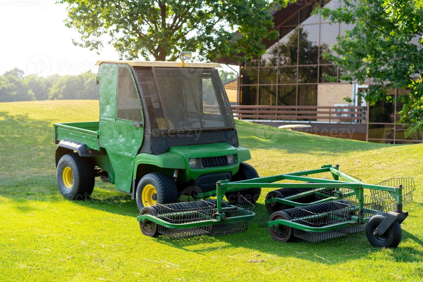 Golf ball piker collector machine Electric car for collect golf balls on field photo
