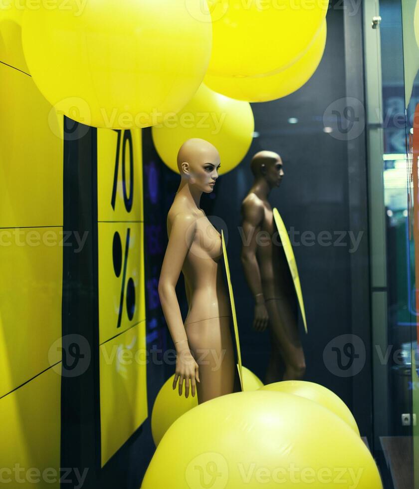 mannequin in a shop window with discount sale photo