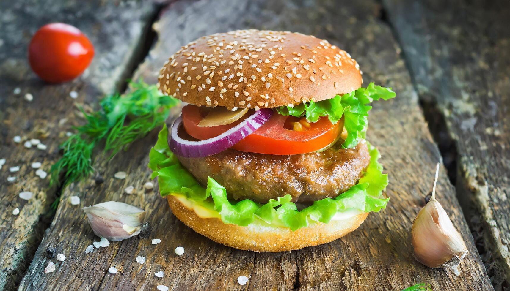 AI generated Delicious hamburger on a wooden base photo