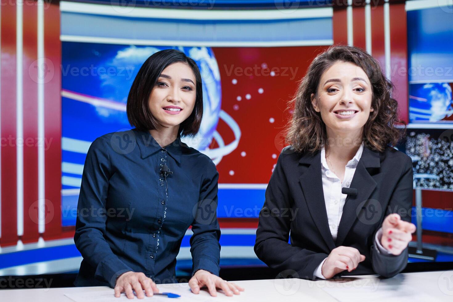 Morning talk show hosts present news, reporting live information about global events with professional tv reportage. Media journalists working on entertainment segment doing newscast. photo