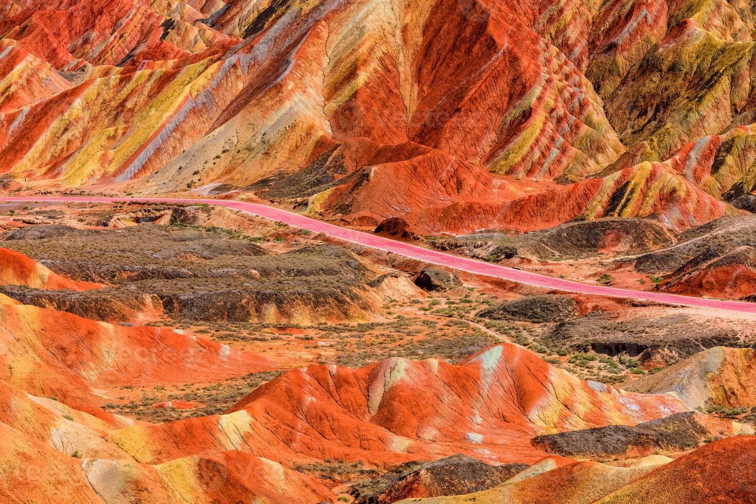 Amazing scenery of china mountains and blue sky background in sunset. Zhangye Danxia National Geopark, Gansu, China. Colorful landscape, rainbow hills, unusual colored rocks, sandstone erosion photo