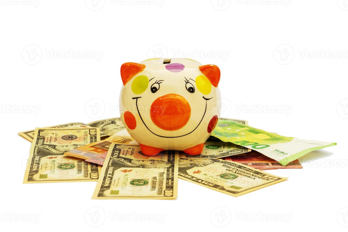 Piggybank and money tower , to save , saving money for affordable things, financial concept .Piggybank or deposit box on a white background, depict saving money to make a trust fund for children photo
