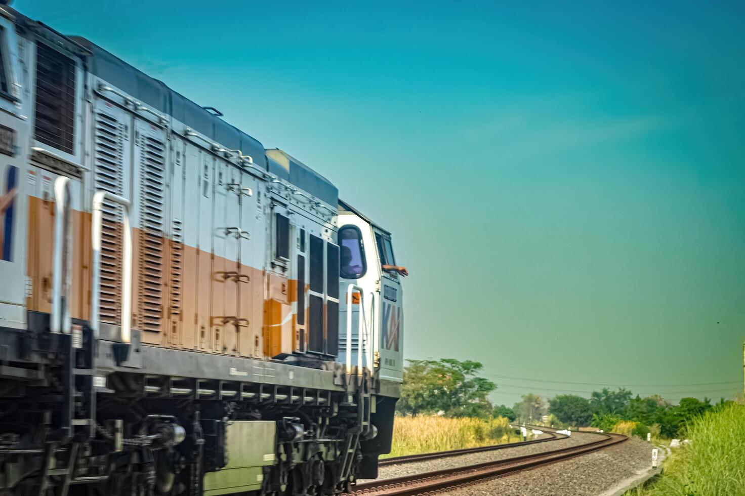 a CC206 locomotive made by General Electric belonging to PT Kereta Api Indonesia which is speeding fast, Indonesia, 28 October 2023. photo