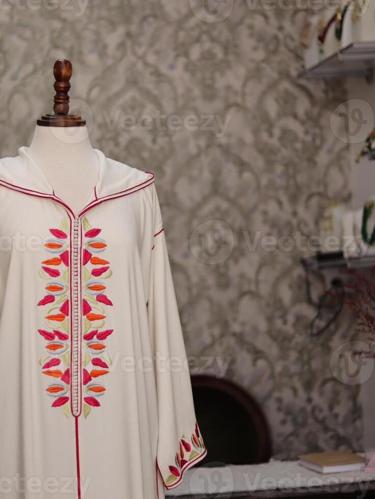 Traditional Moroccan djellaba, hand-stitched photo
