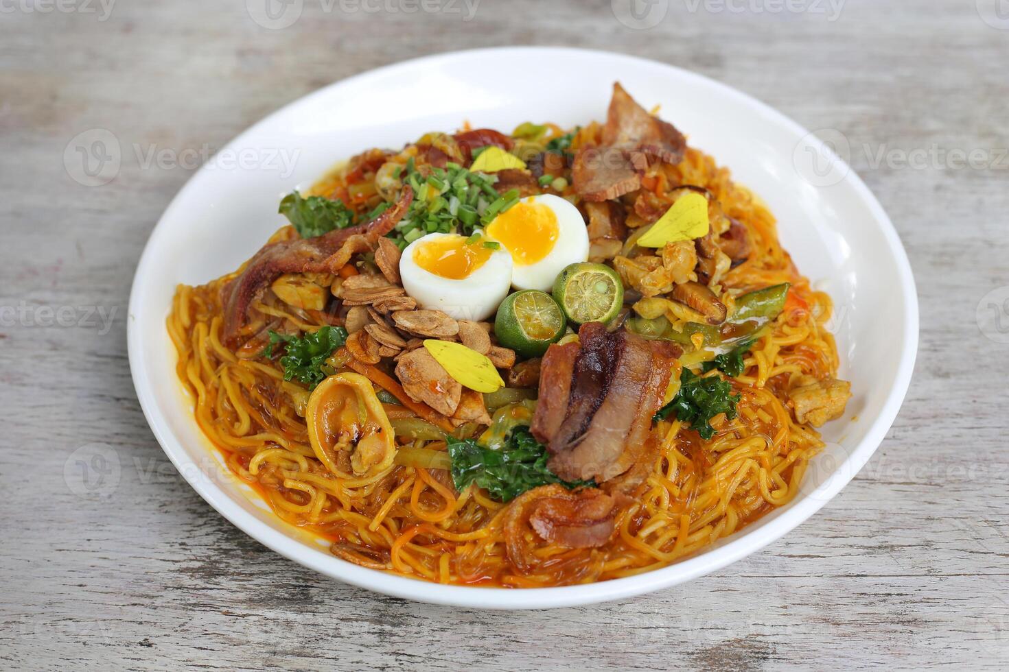 Panciit Hacienda pasta noodles served in a dish isolated on grey background side view photo