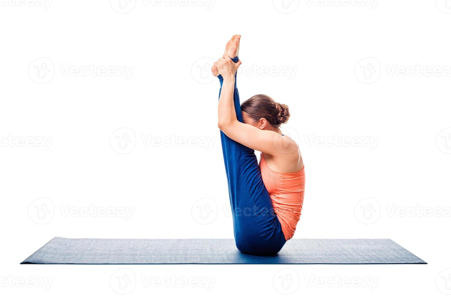 Woman doing Ashtanga Vinyasa yoga asana Urdhva mukha paschimotta photo