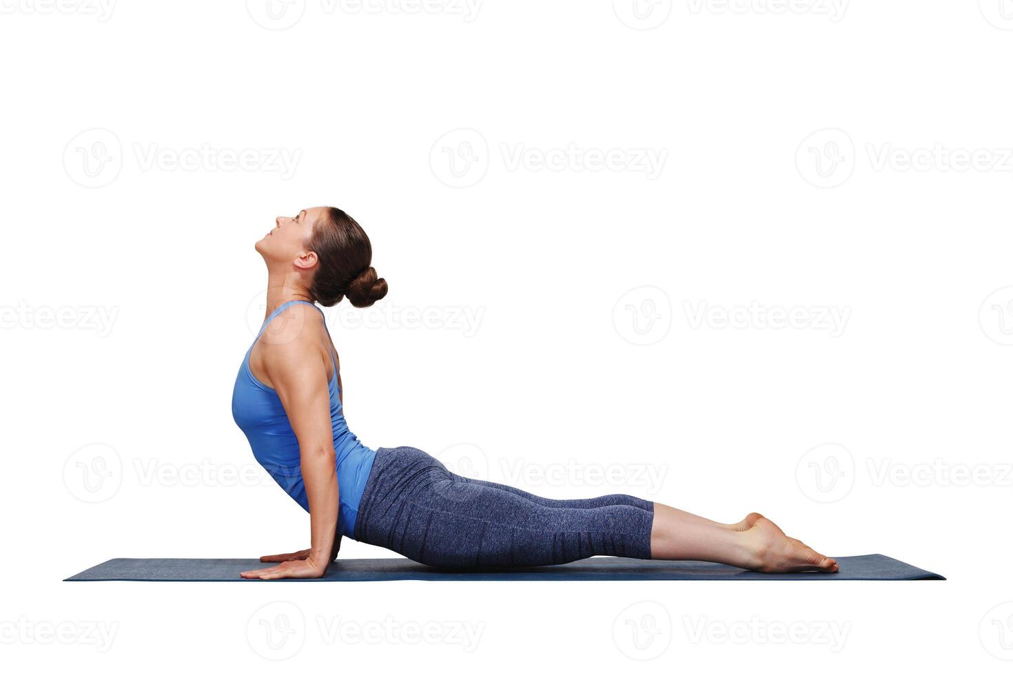 Woman doing Ashtanga Vinyasa yoga Sun Salutation asana photo