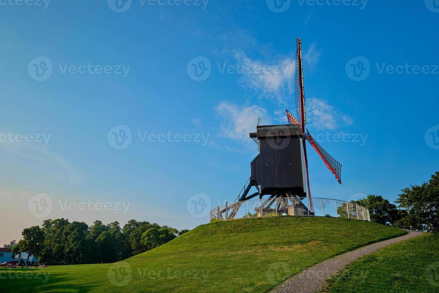 Sint-Janshuismolen Sint-Janshuis Mill windmill in Bruges on sunset, Belgium photo