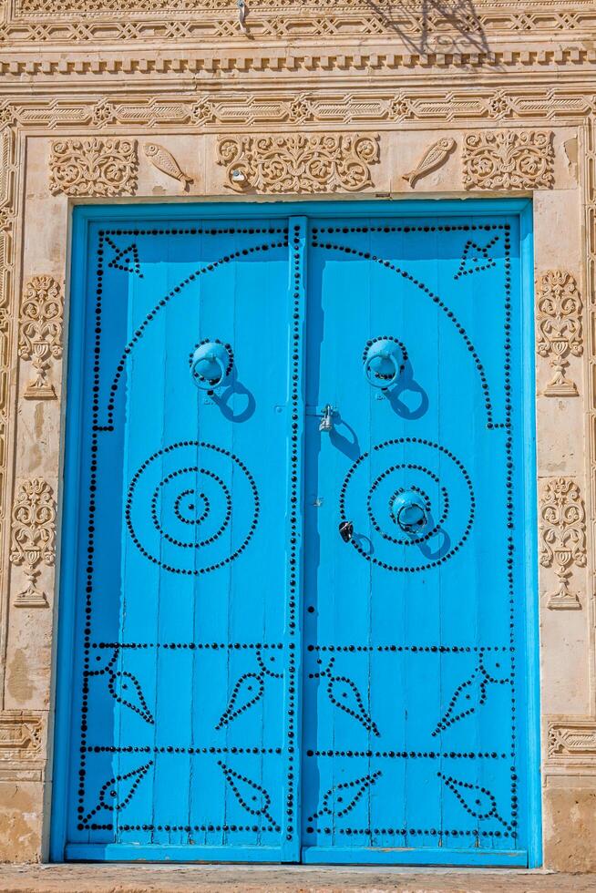 Decorative door in Kairouan, Tunisia photo