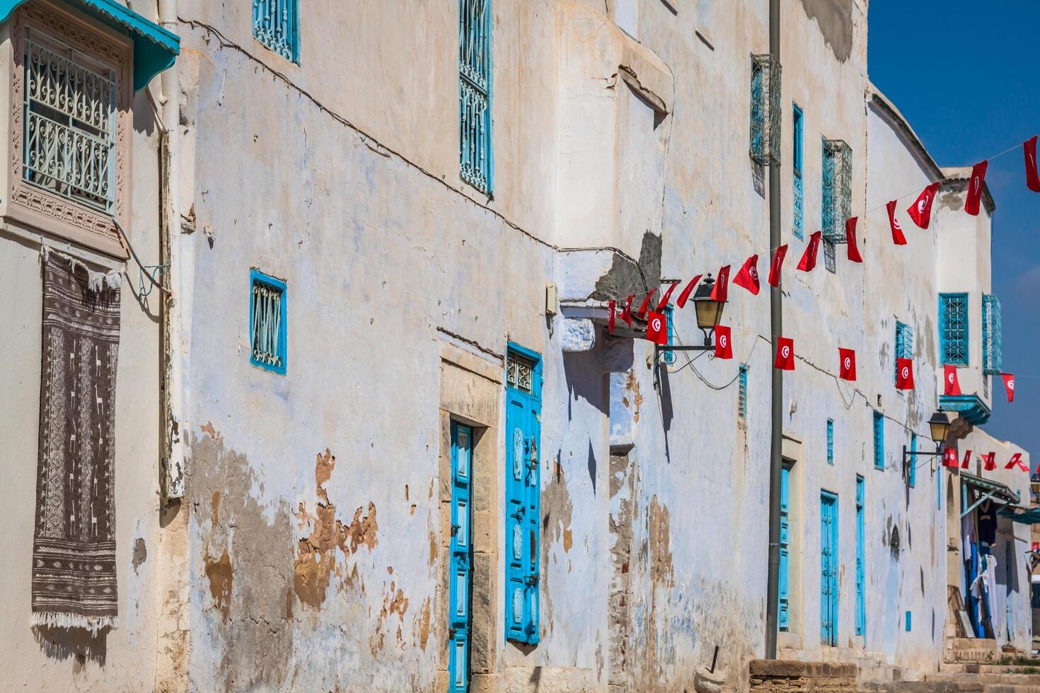 Traditional white-blue house from kairouan, Tunis photo