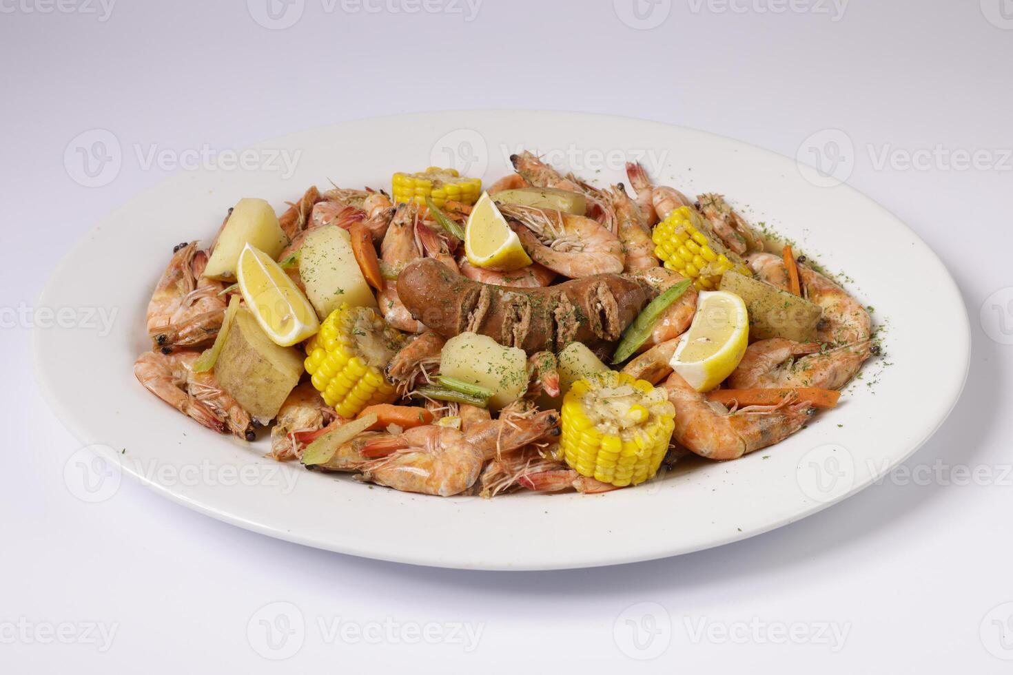 ALL SHRIMPS CLAWDADDY BOIL in a dish top view on grey background singapore food photo