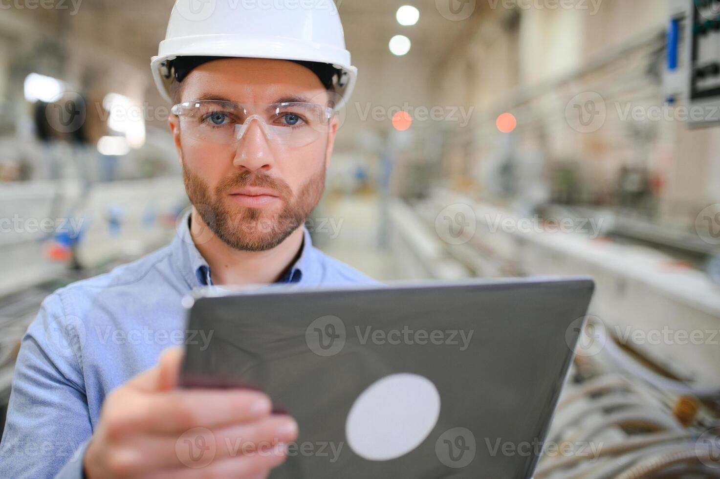 Engineer,Industry and construction concept. Portrait of caucasian Industry factory maintenance engineer photo